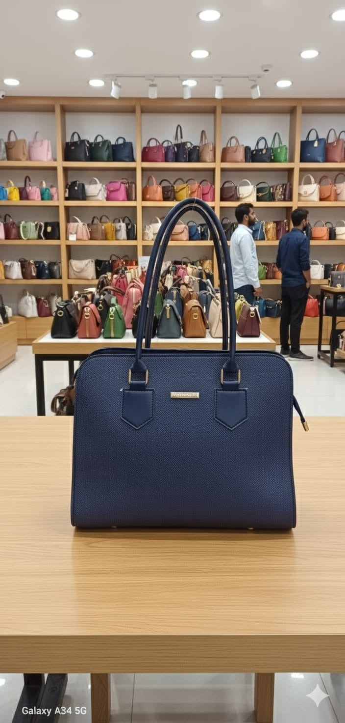 𝐸𝑙𝑒𝑔𝑎𝑛𝑧𝑎 𝐻𝑎𝑛𝑑𝑏𝑎𝑔𝑠